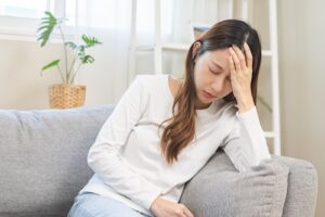 Woman In Pain At Home - Settled With Insurance