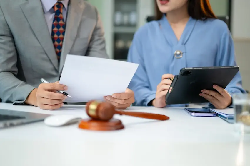 Atlanta car accident attorney coordinating medical lien agreements to prevent hospital lawsuit over unpaid bills